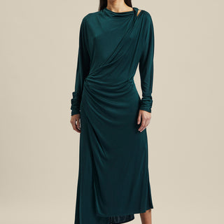 Model wearing the forest green silk Coalesce Twist Front Dress from Australian women’s designer Ginger and Smart featuring bias cut, cut out derail above the collarbone and midi length.