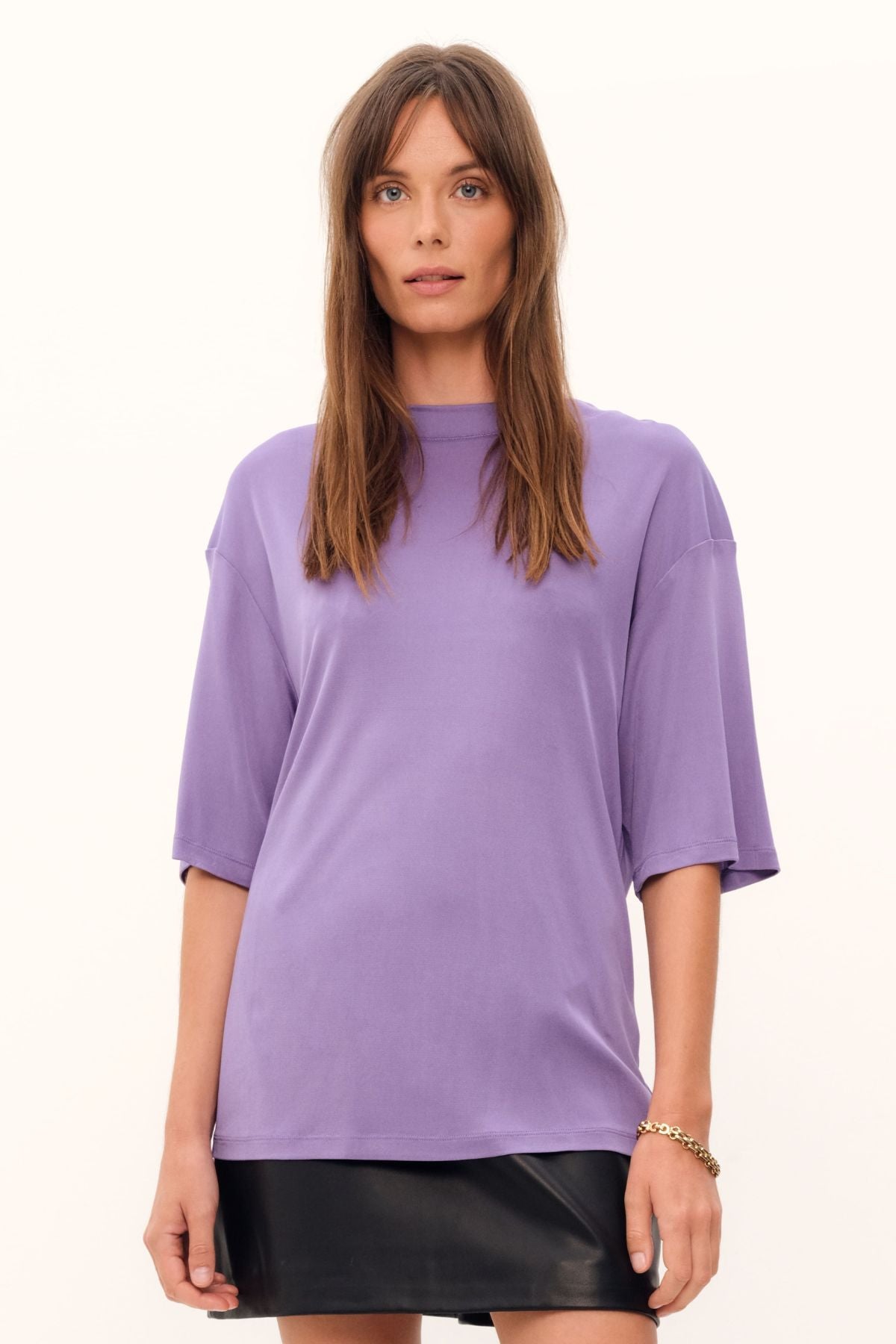 Exquisitely crafted from silk viscose jersey in a delicate lilac hue, the Aphrodite Top boasts a casual tee silhouette, a luxuriously silken knit fabric, and a sleek, high, round neckline.