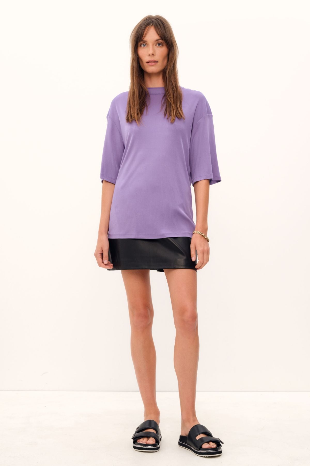 Exquisitely crafted from silk viscose jersey in a delicate lilac hue, the Aphrodite Top boasts a casual tee silhouette, a luxuriously silken knit fabric, and a sleek, high, round neckline.